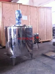Stainless steel blending tank with a top mounted motor