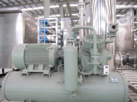 Side view of a green refrigeration unit and its motor