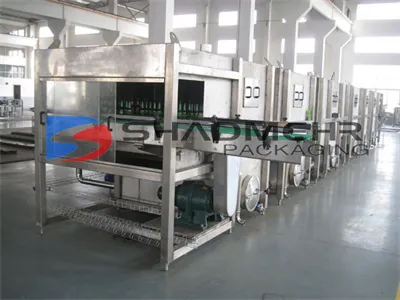 Front view of a bottle warming tunnel with enclosed panels