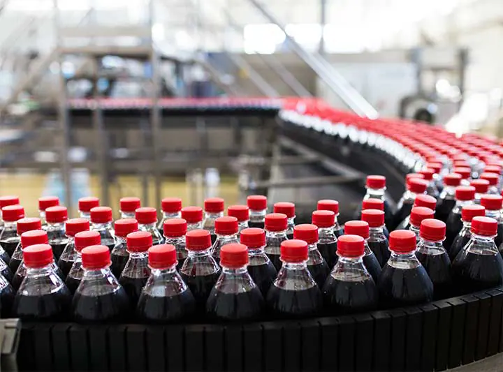 Carbonated drink bottles on a conveyor