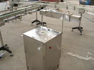 Compact shrink machine with a metal cabinet and pipe connections