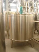 Cylindrical stainless steel mixing tank on support legs