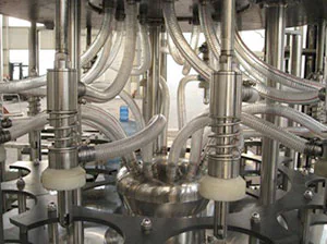 Transparent hoses connected to the rotary filling mechanism