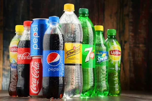 Assorted carbonated soft drink bottles
