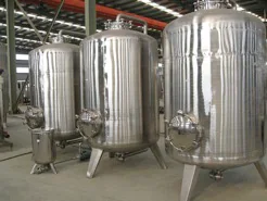 Stainless steel water tanks standing in the factory workshop
